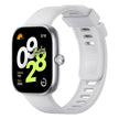 Silver-gray Xiaomi MI Redmi Watch 4 smart watch displaying digital time and fitness tracking features on a sleek screen.